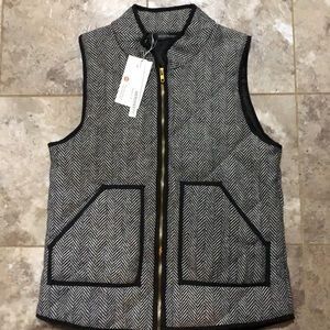 Black and white vest